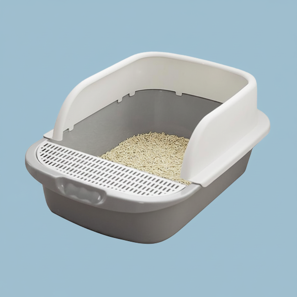 Side angle view of cat litter box showing depth and ergonomic handle cutouts