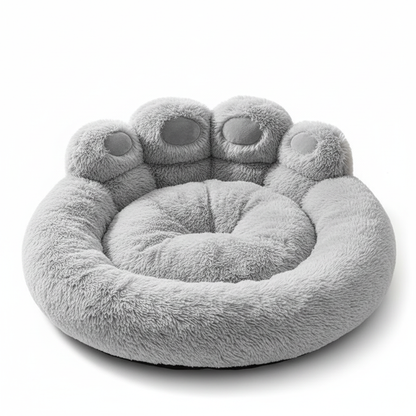 Bear paw shaped round plush dog bed in light gray shaggy fabric
